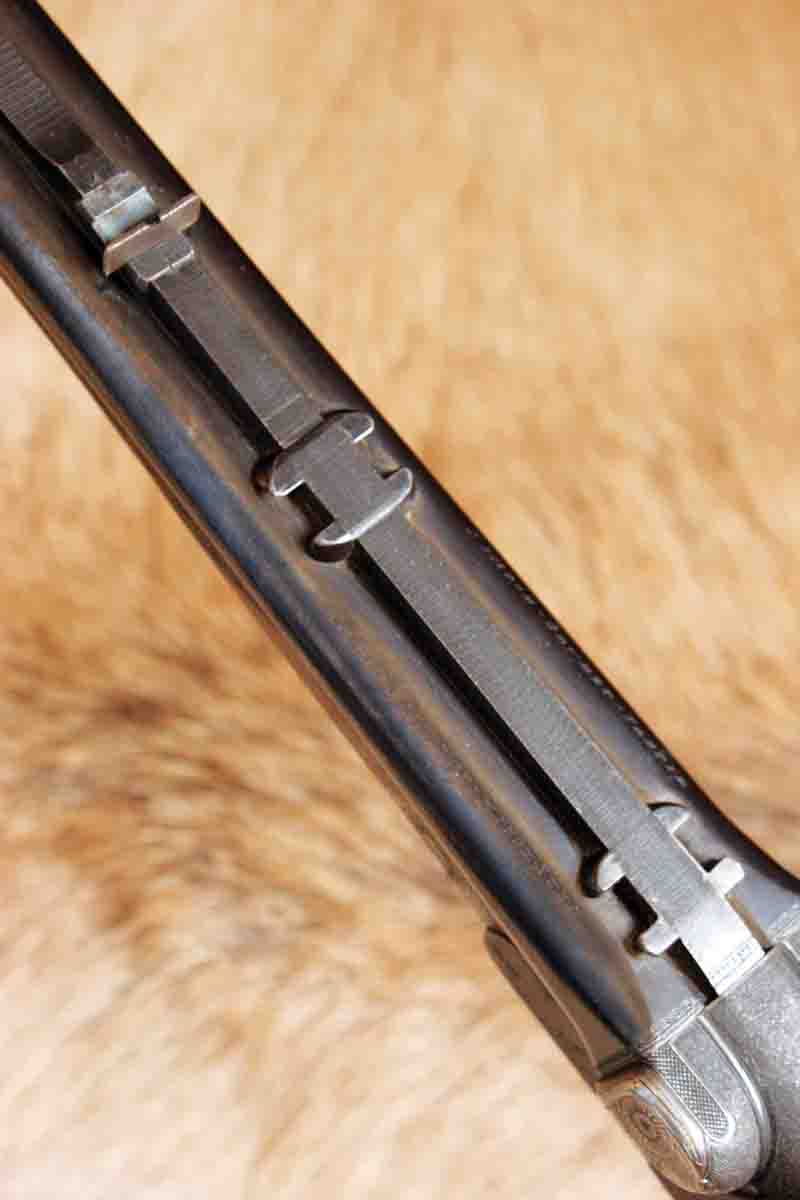 A flip-up rear leaf sits on the barrel rib, which also includes two dovetails for scope mounts.